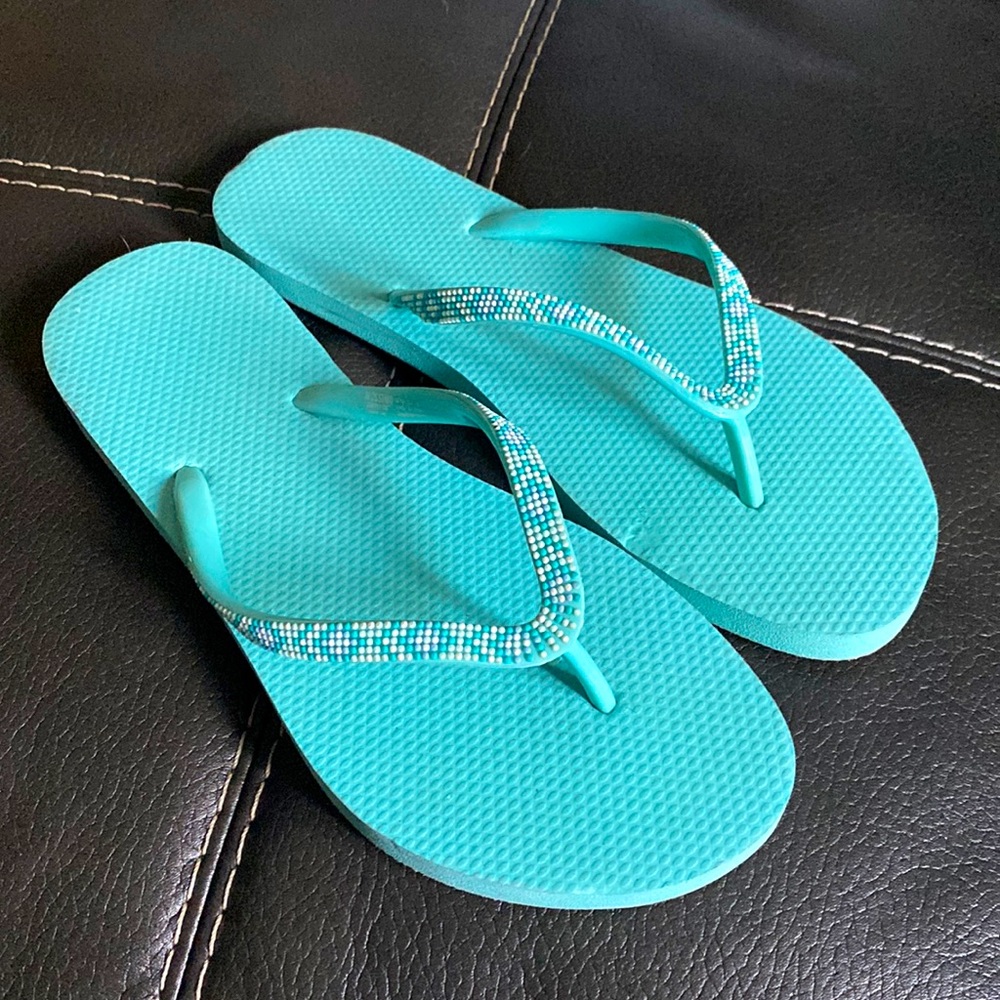 Teal flip flops